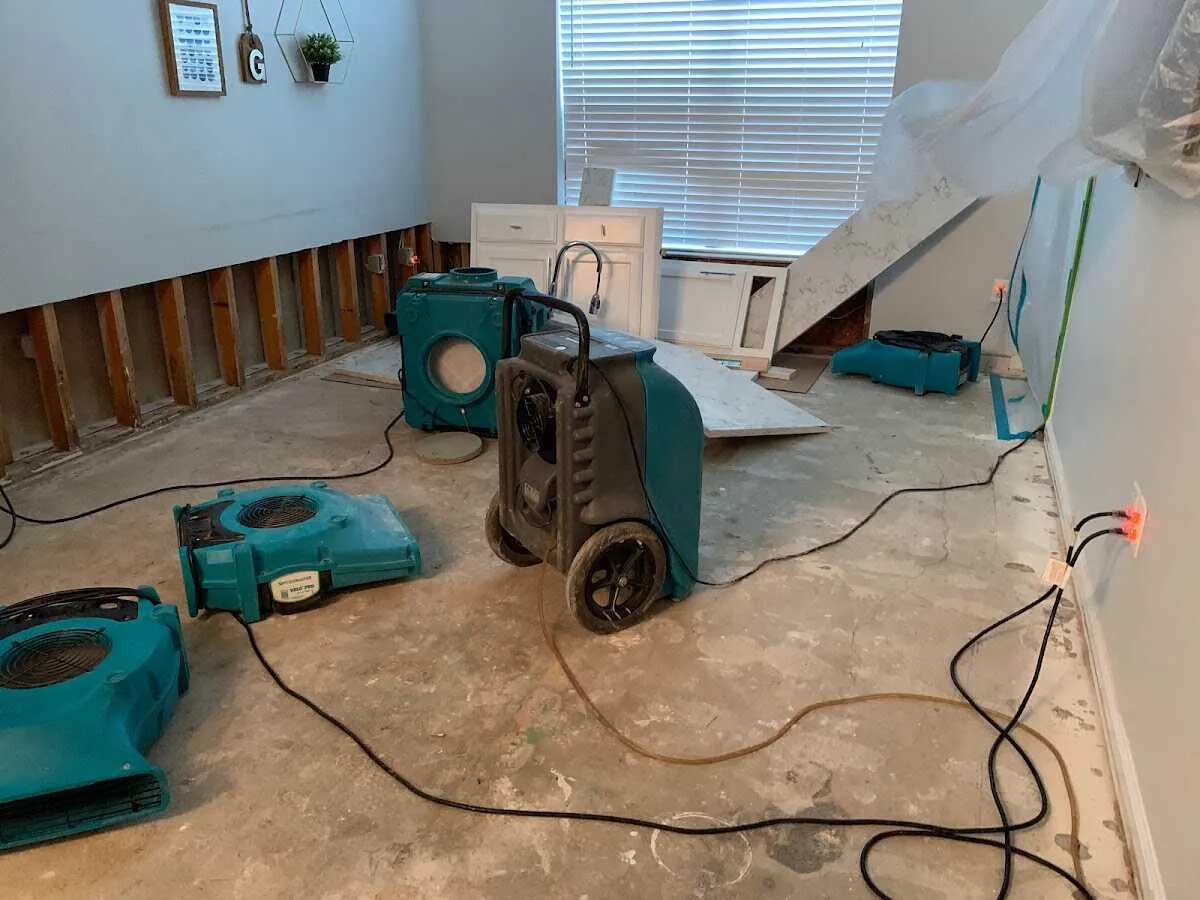 Dehumidifier in flood-cut room for Water Damage Restoration in Belding